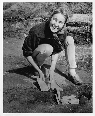 Anne Stine Ingstad at L'Anse aux Meadows, 1963. Ingstad, along with her husband, led an archeological excavation of the site. (photos are taken from Wikipedia)